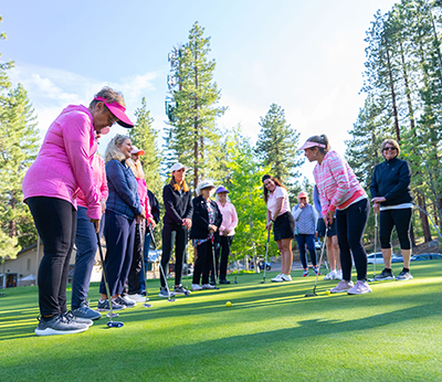 ashley teaches putting clinic to circle of women at the Incline Village Mountain Golf Course